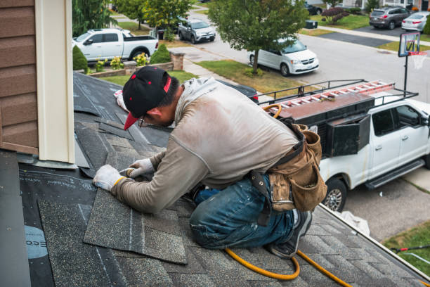 Professional Storm Damage Roof Repair technician working in Roseland, FL